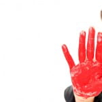studio shoot with red paint on hands